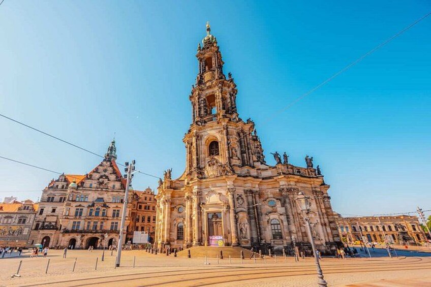A historic cathedral with a prominent bell tower and intricate architecture. 4