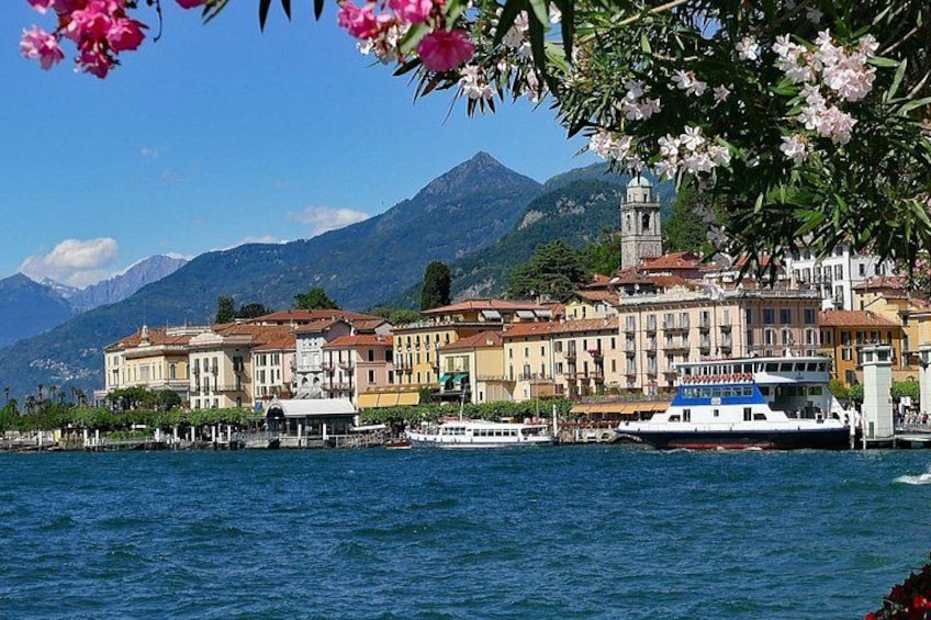 A lake with buildings and a boat. 3