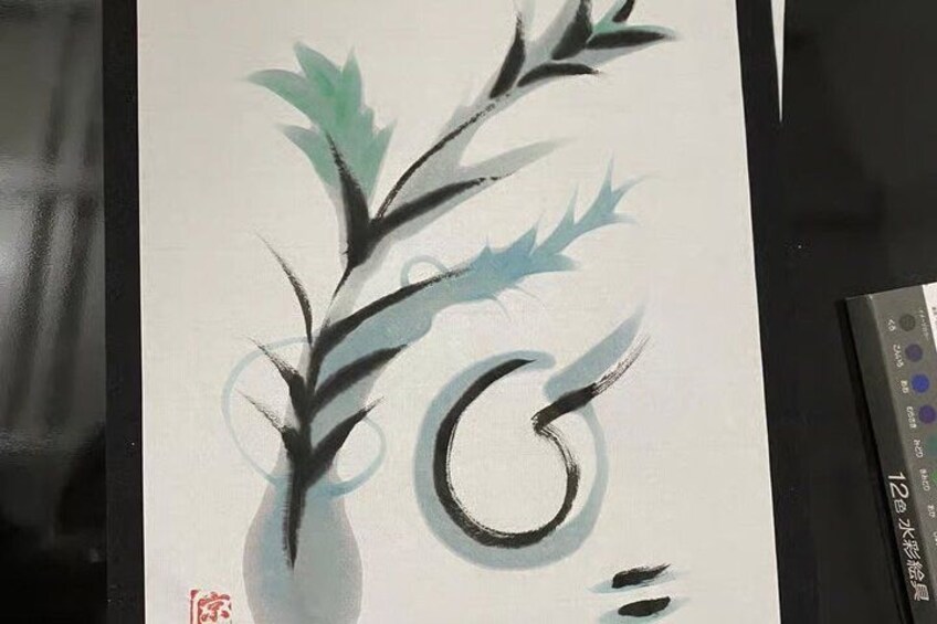 A calligraphy piece with a vase and stylized leaves. 3