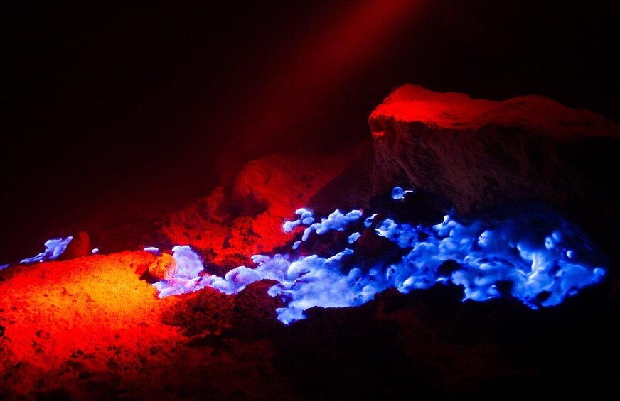 A lava flow with red and blue glowing areas. 5