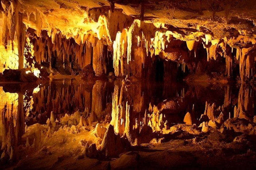 A cave with stalactites and stalagmites. 5