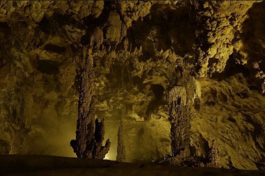 A cave with stalactites and stalagmites. 4