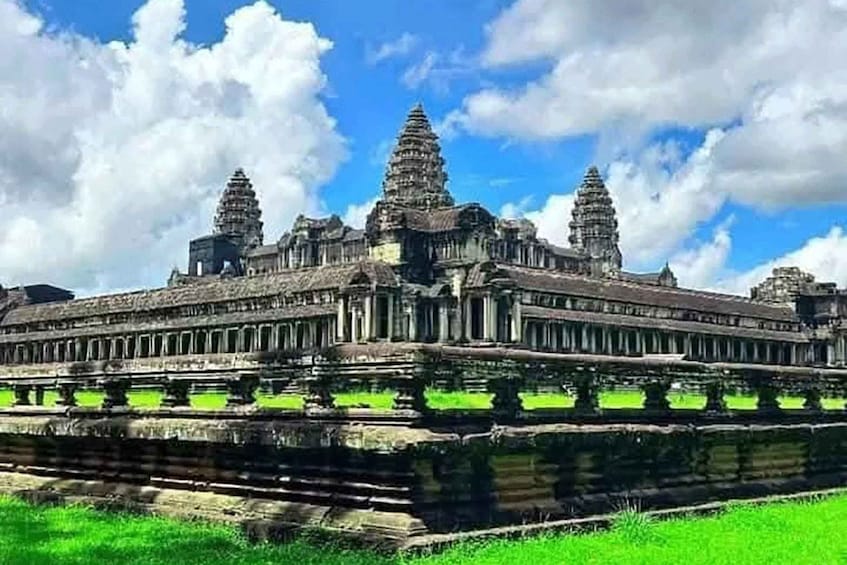Angkor Wat temple complex with multiple towers and a large central structure. 3