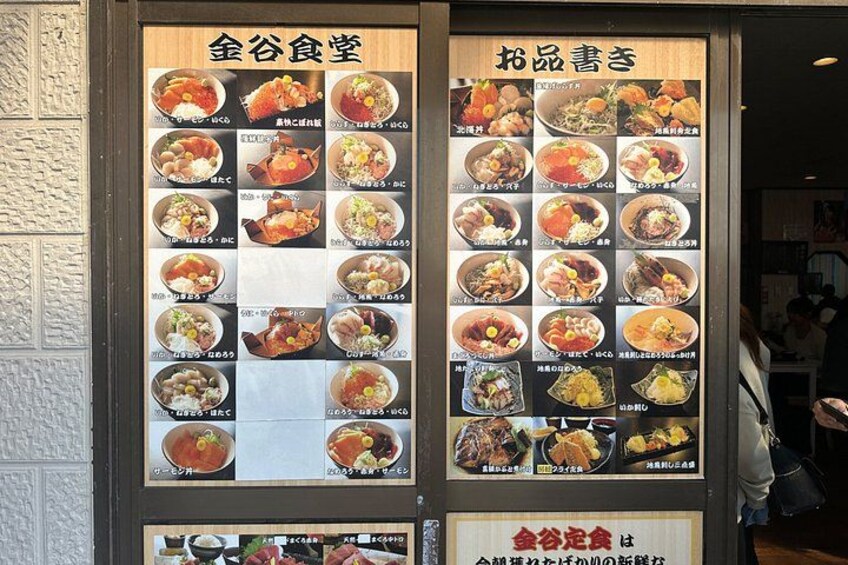 A restaurant menu with various dishes displayed. 4