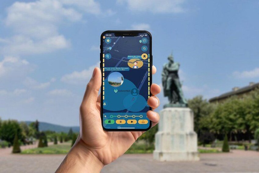 A hand holding a smartphone displaying a map with a location pin, a compass, and various icons. 4