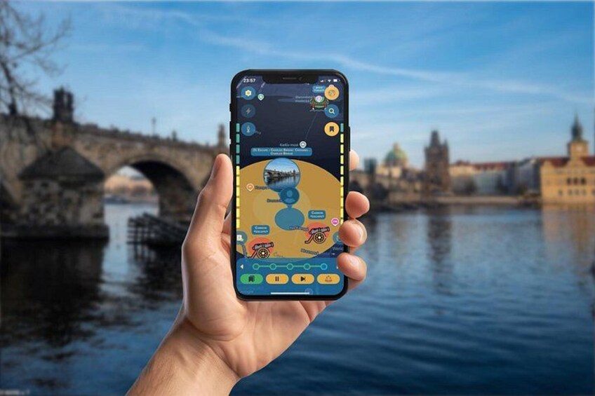 A hand holding a smartphone displaying a map with a bridge and buildings in the background. 3