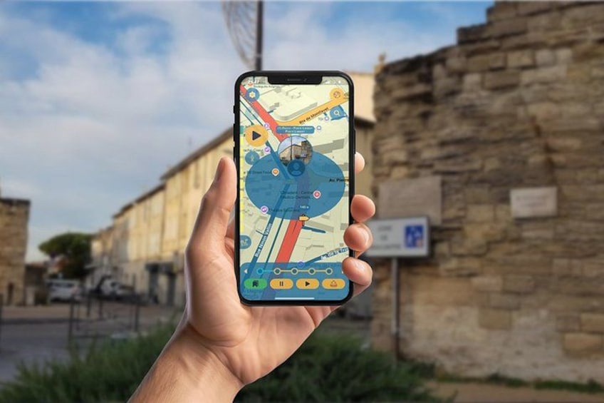 A hand holding a smartphone displaying a map with a location pin. 1