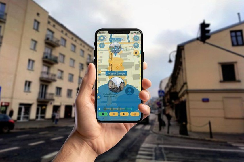 A hand holding a smartphone displaying a map with a location pin. 3