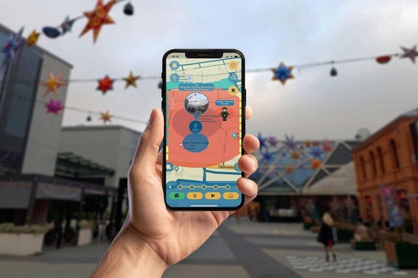 A hand holding a smartphone displaying a map with a location pin. 2