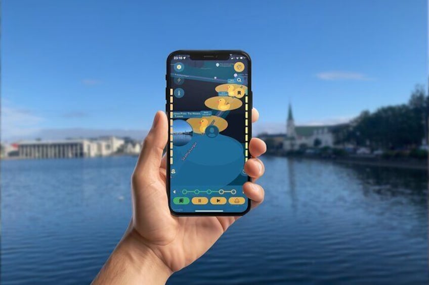 A hand holding a smartphone with a map application, a river, and a distant building in the background. 3