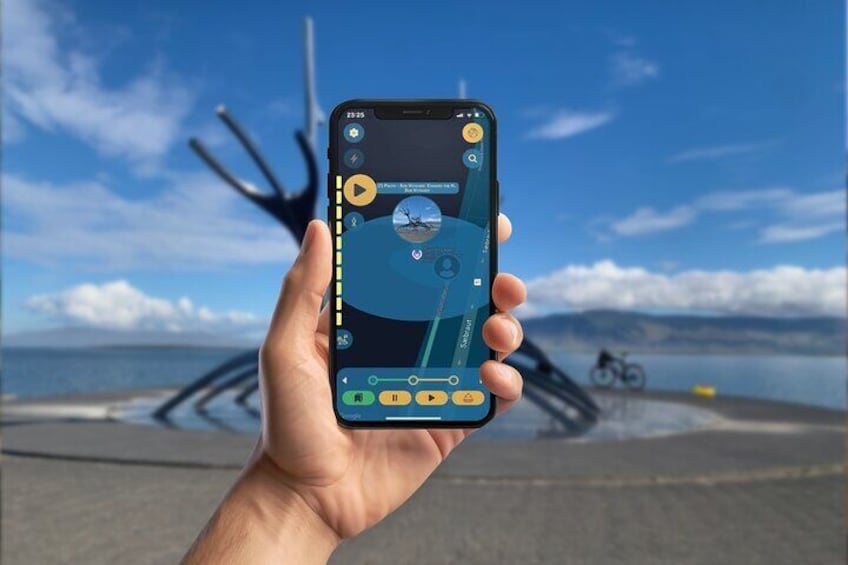 A hand holding a smartphone displaying a map with a bicycle in the background. 2