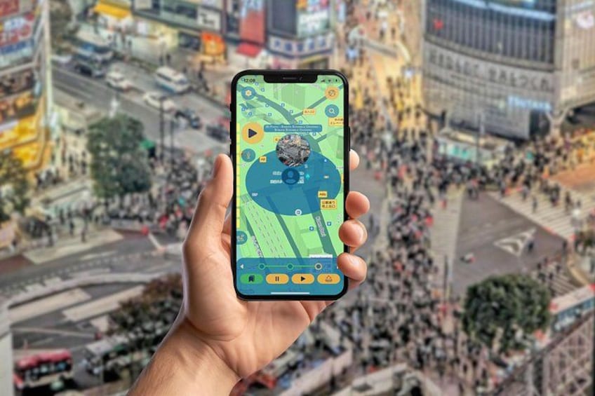 A hand holding a smartphone with a map application, displaying a busy urban area with buildings and streets. 2