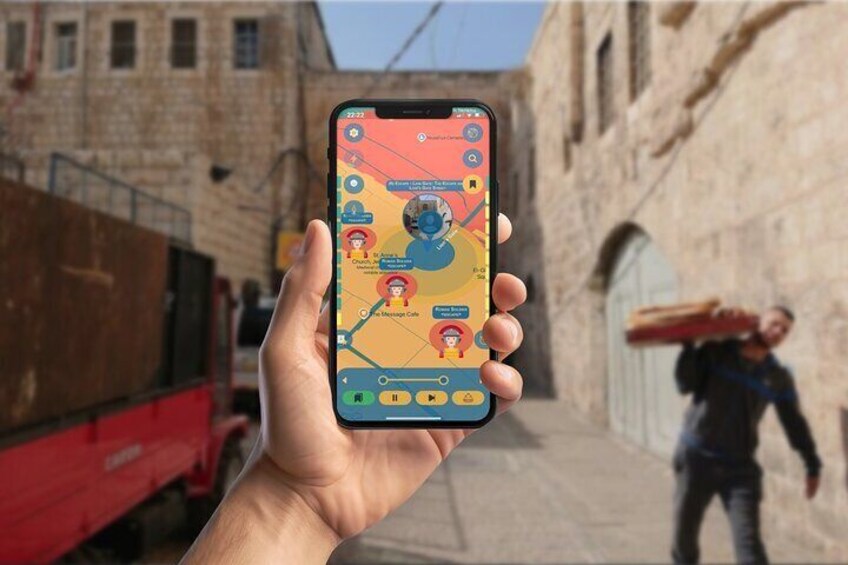 A hand holding a smartphone displaying a map with icons and a person carrying a red object in an urban alleyway. 2