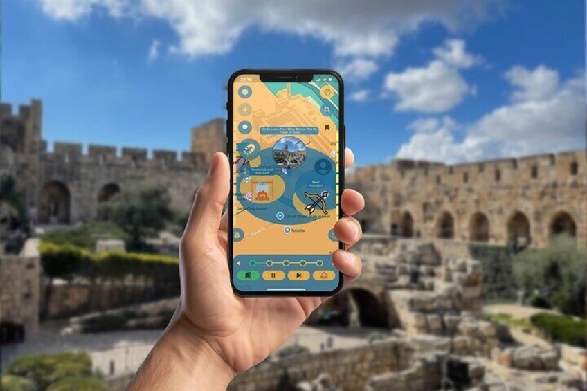 A hand holding a smartphone with a map application, displaying a location with a castle in the background. 4