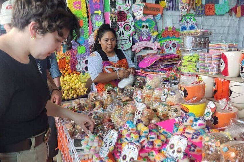 Build a Day of the Dead and Shopping Offering on the market. 1