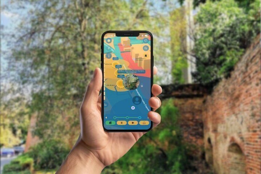 A hand holding a smartphone displaying a map with various icons and a location pin. 4