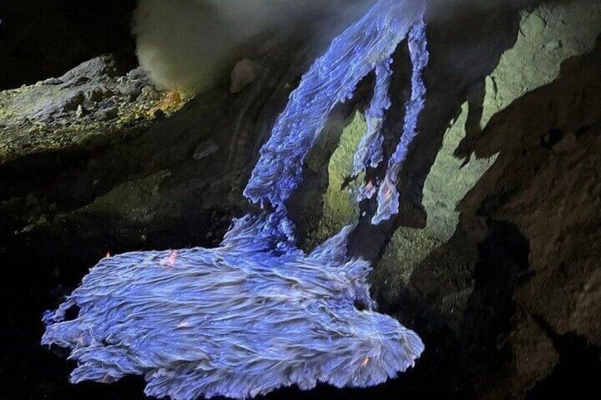 A cave with stalactites and stalagmites. 3