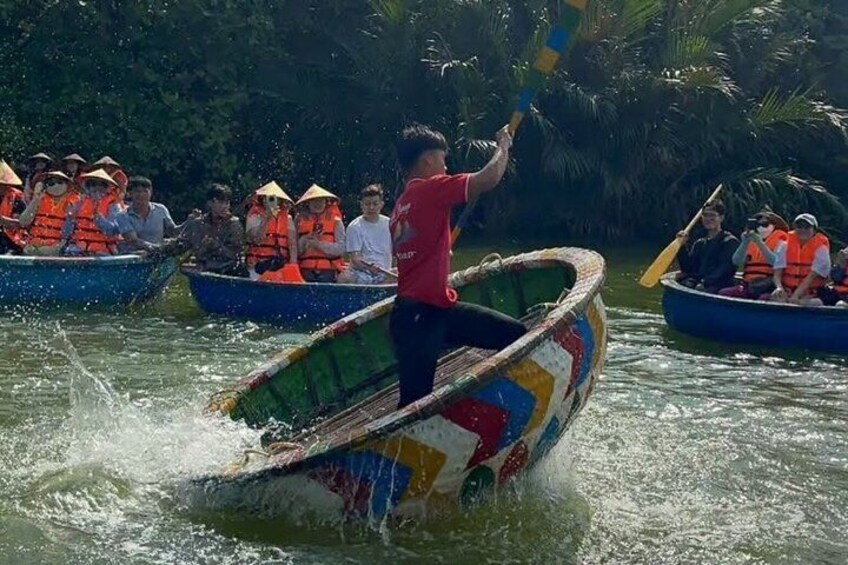 A group of people in a boat race, wearing life jackets and paddling. 3