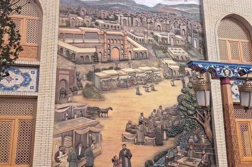A detailed mural of a historical cityscape with buildings, people, and animals. 4