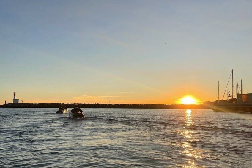 Set in miniboat at sunset 1