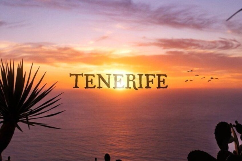 A sunset over the ocean with the word 'TENERIFE' visible. 4