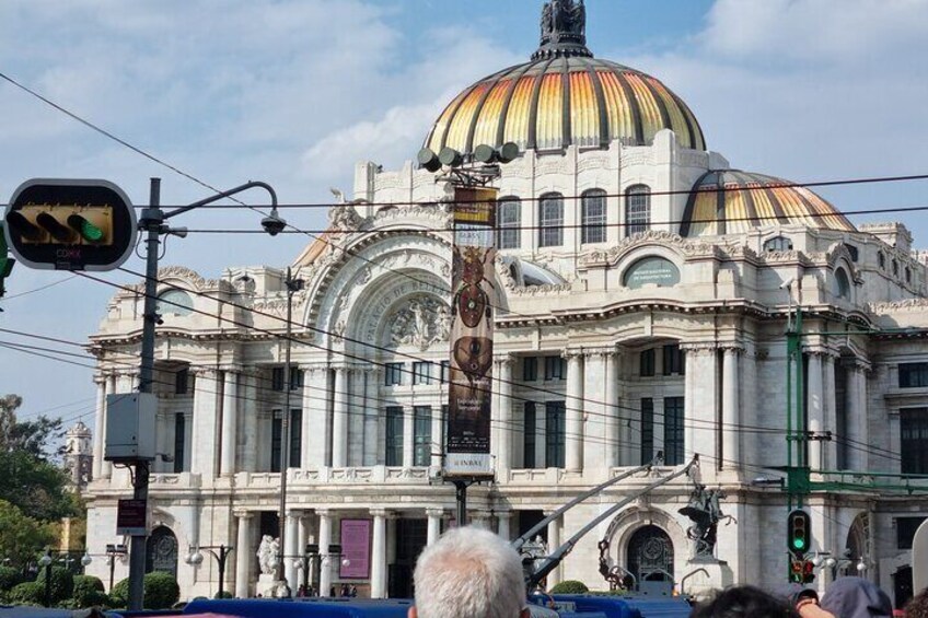 A historic building with a large dome and classical architecture. 5