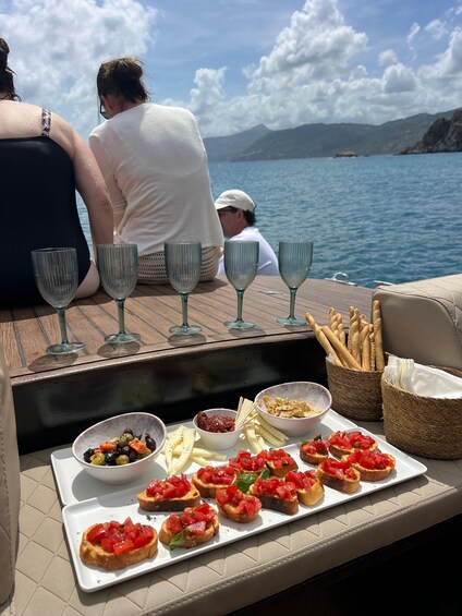 Picture 4 for Activity Coast-to-coast boat tour in Cefalù with Sicilian aperitif on board 3