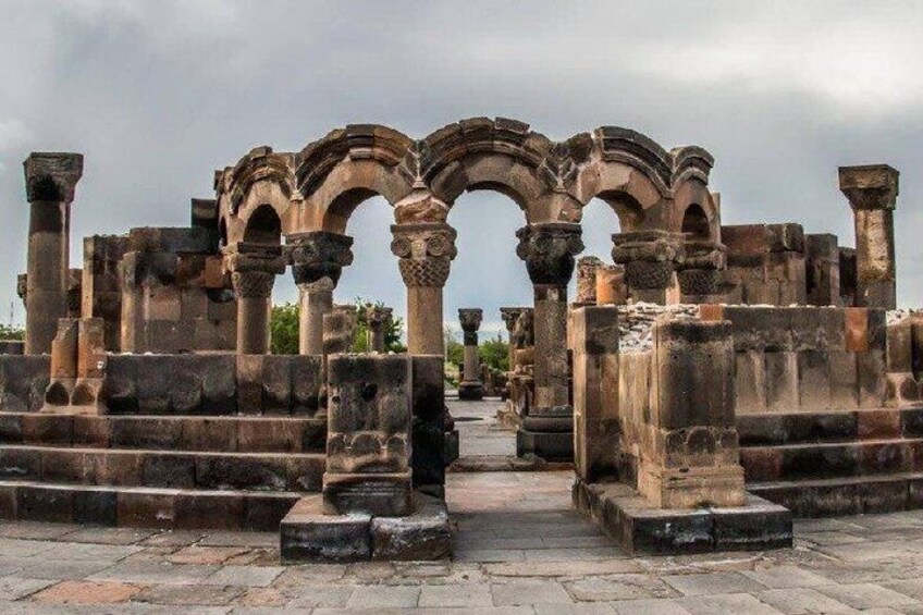 Ancient ruins with arches and columns. 1