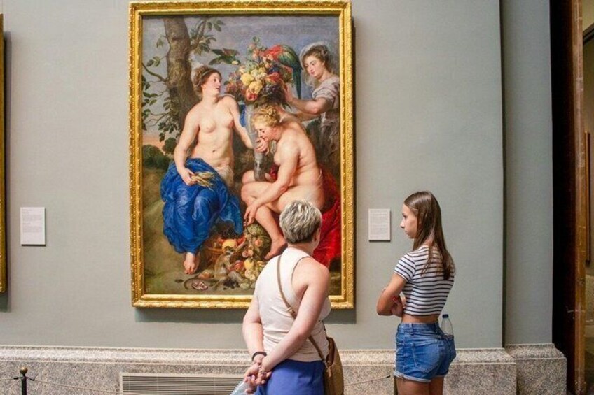 A classical painting in an art gallery with visitors observing it. 3