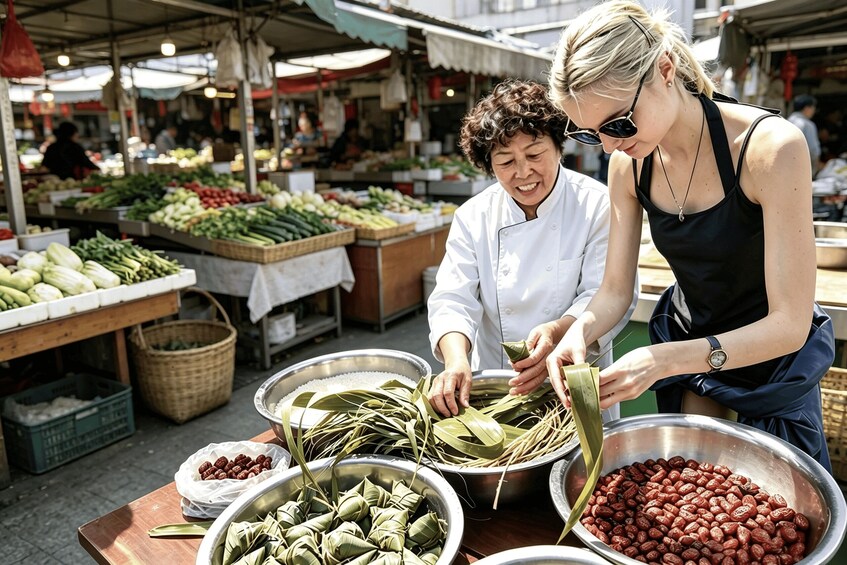 Chengdu: Street Food Cooking Class with Local Snack Masters 1