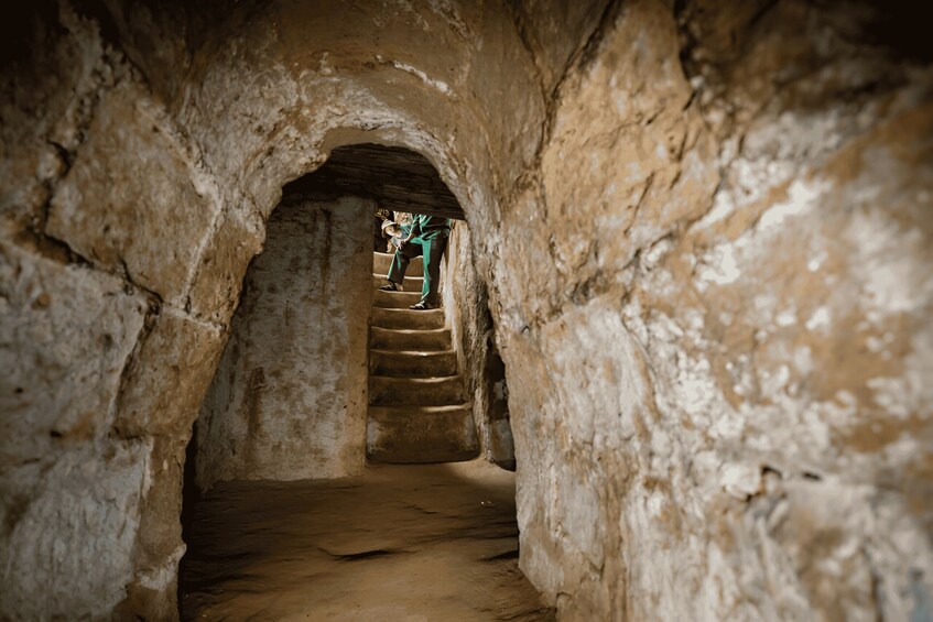 A stone staircase in a cave. 3