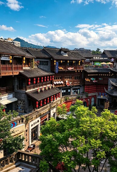 A traditional Chinese courtyard with multi-tiered buildings, red lanterns, and lush greenery. 1