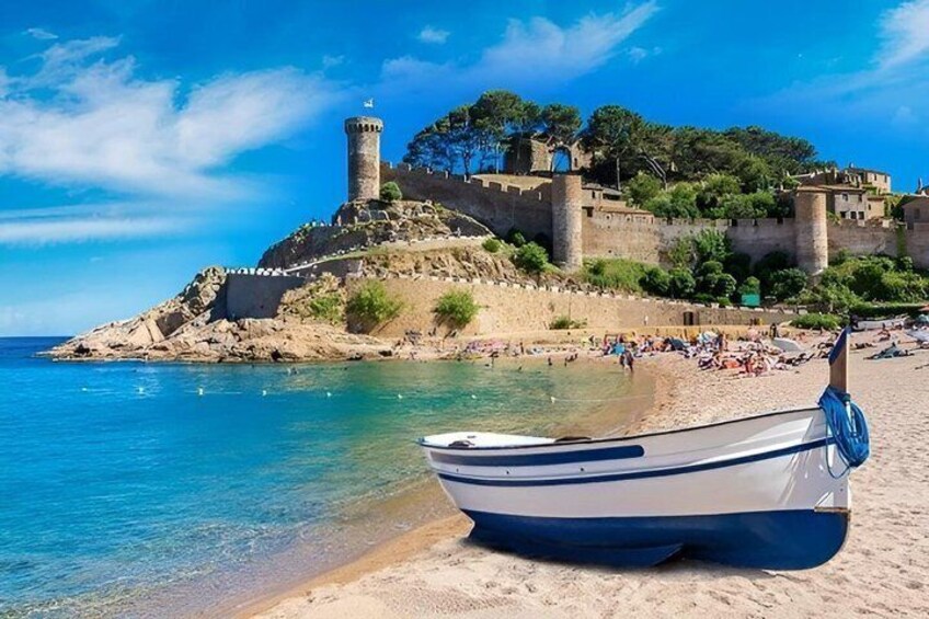 A coastal scene with a beach, a boat, and a historic castle. 1