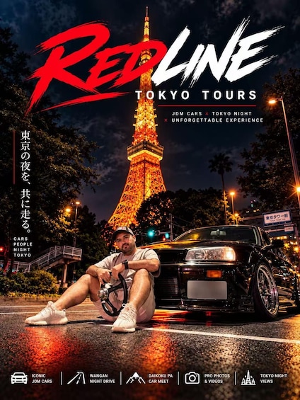 A person sitting next to a classic car with the Eiffel Tower in the background. 2