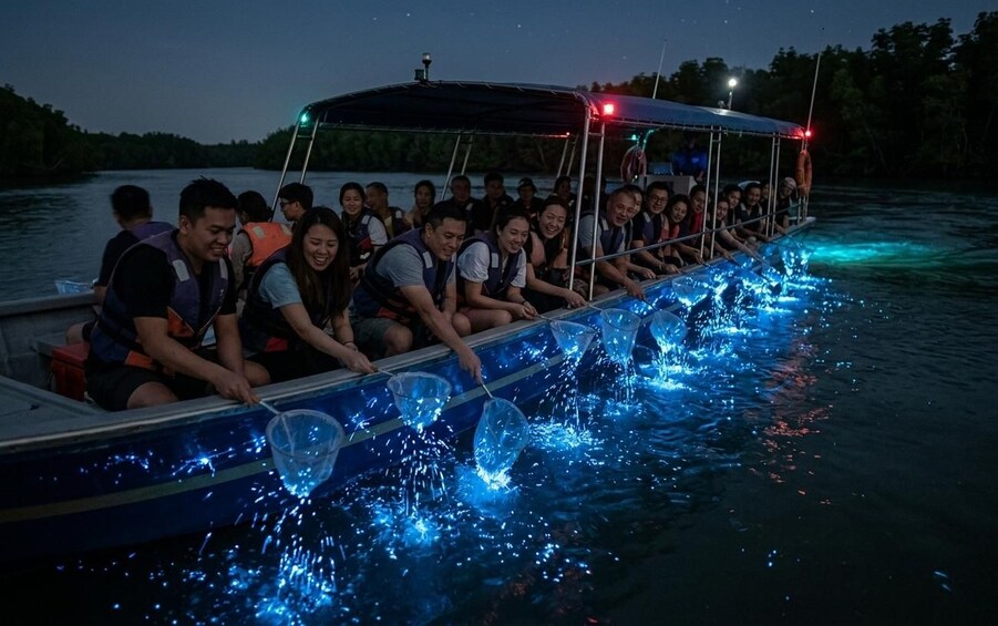 A boat with people fishing at night. 5