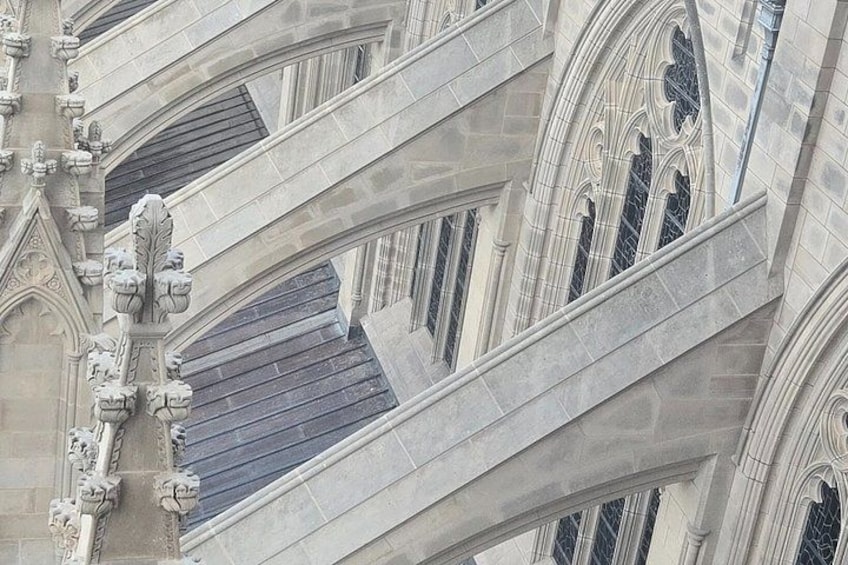 A Gothic-style building with pointed arches and intricate stonework. 2