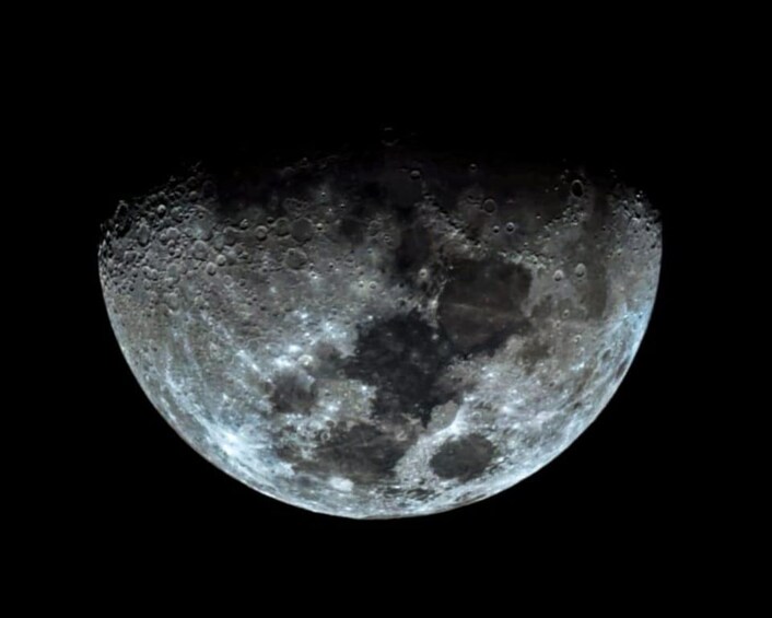 A detailed view of the moon's surface with craters and lunar maria. 3