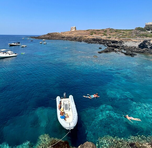 Boat Tour: Island tour by inflatable boat with a visit to the caves and snorkeling 1