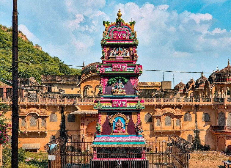 A colorful temple with intricate architecture and statues. 3