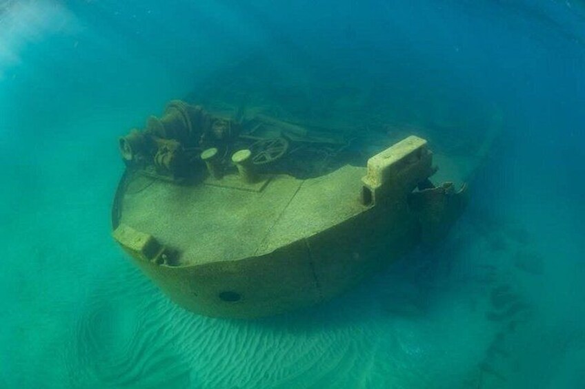 An underwater wreck with a conning tower and deck structures. 3