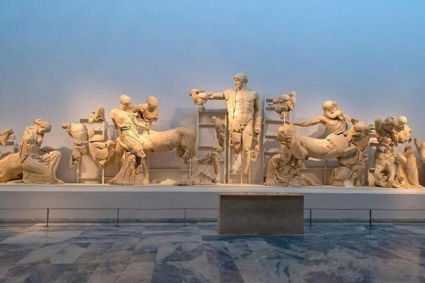 A marble sculpture of a historical battle scene. 4