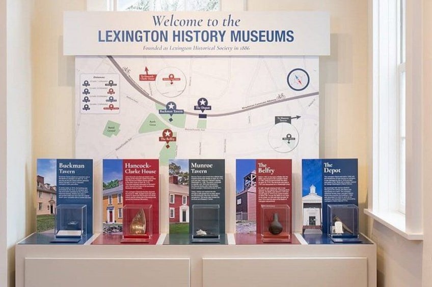 A welcome sign for the Lexington History Museums with a map and information about five historical sites. 4