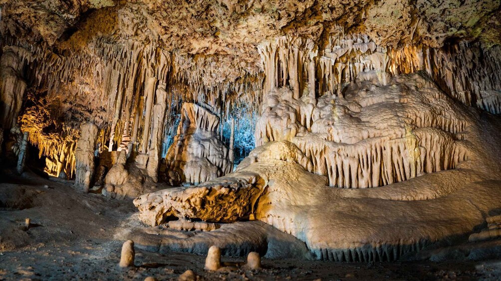 A cave with stalactites and stalagmites. 5