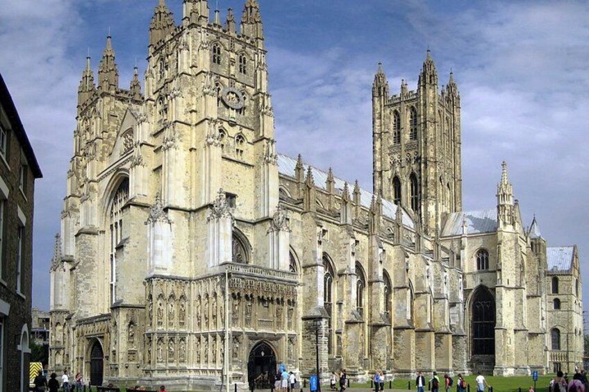 A historic cathedral with intricate architecture, including multiple spires and detailed stonework. 5