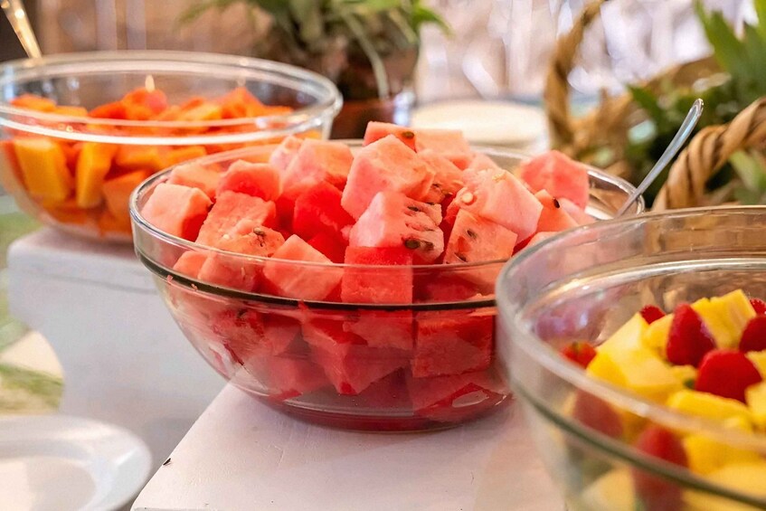 Bowls of watermelon and mango chunks. 5