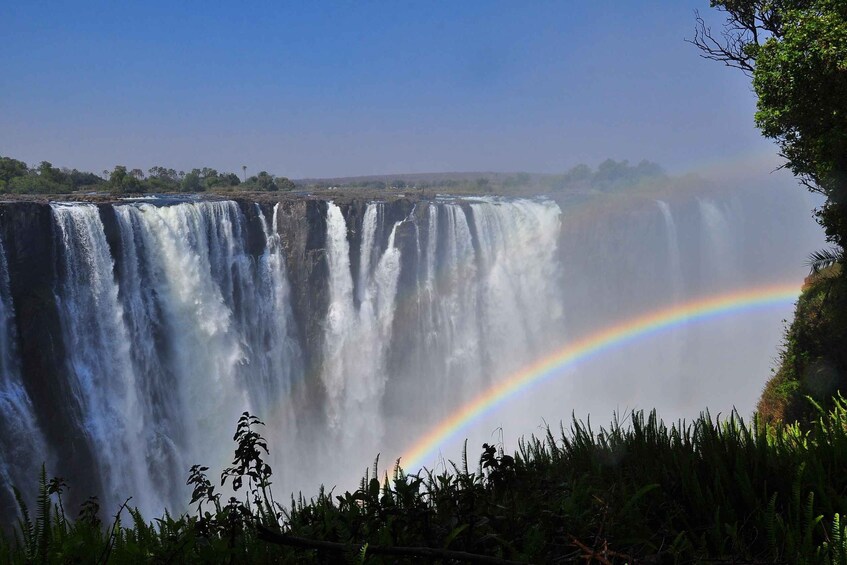 A waterfall with a rainbow. 2