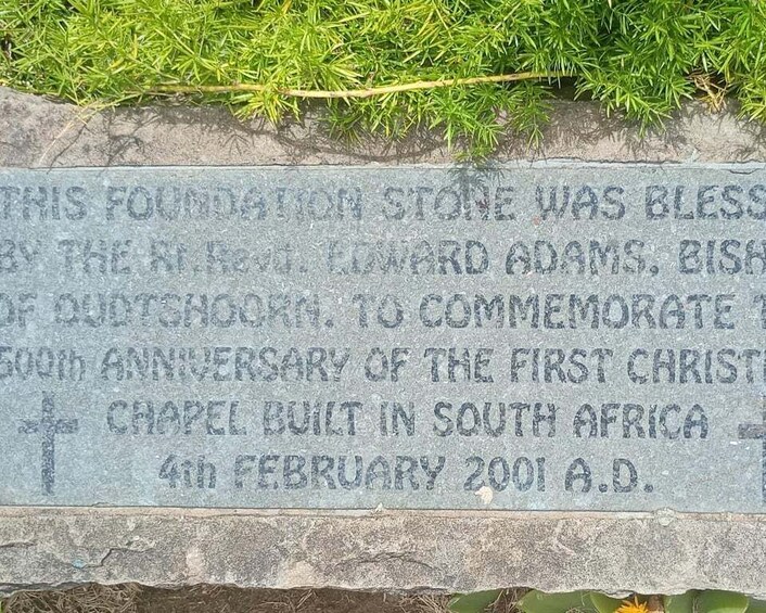 A foundation stone with engraved text commemorating the first Christian chapel in South Africa. 2