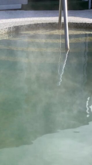 A pool with clear water and a visible crack on the surface. 3