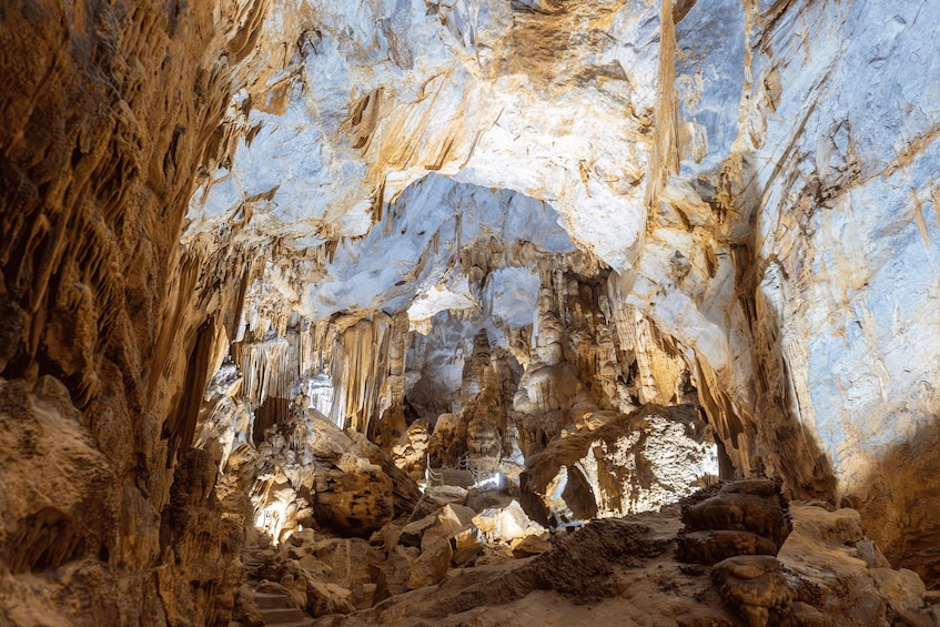 A cave with stalactites and stalagmites. 4