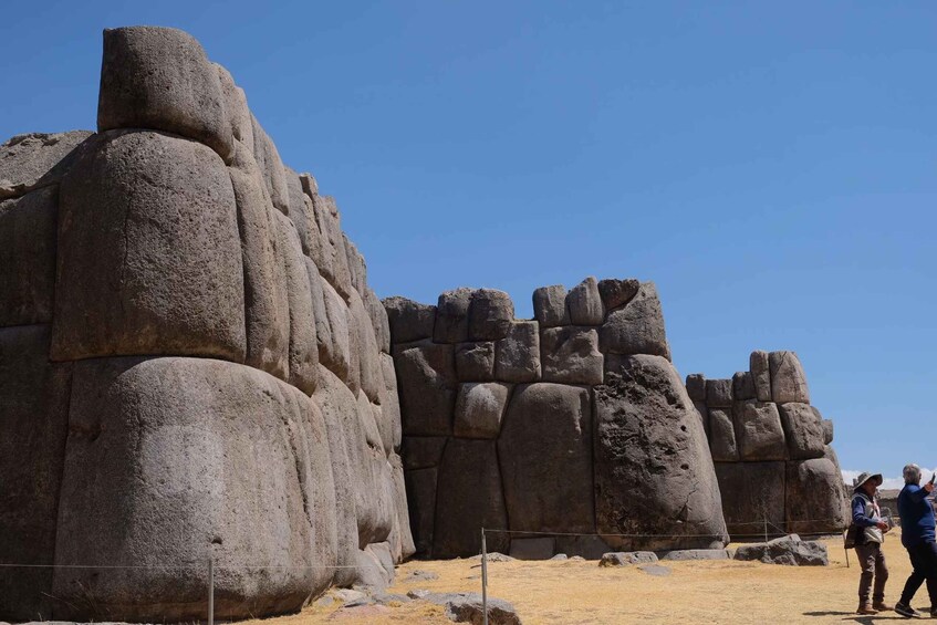 Large rock formations in a dry, open landscape. 4